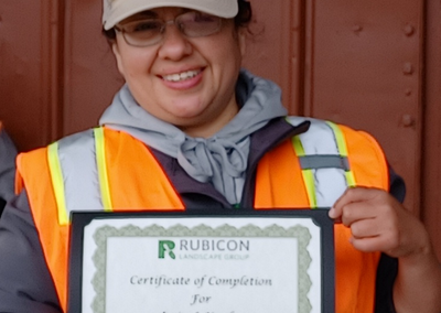 Worker receiving Rubicon training certificate