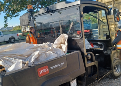 Workers filling truck